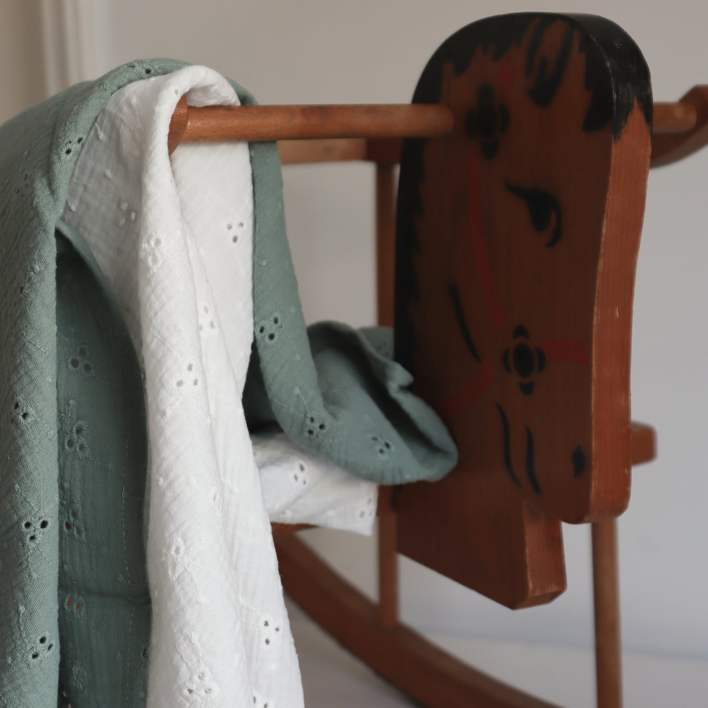 Swaddle Green embroidery